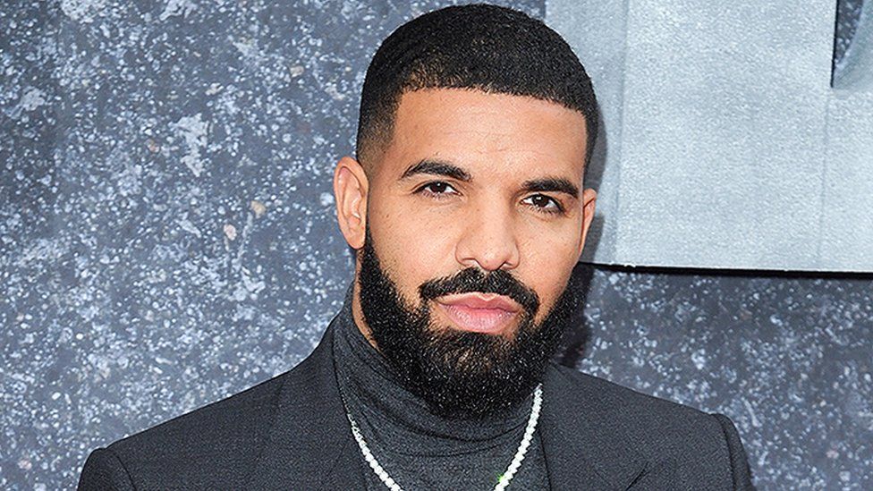 DRAKE BUYS $70 MILLION BEVERLY CREST MANSION